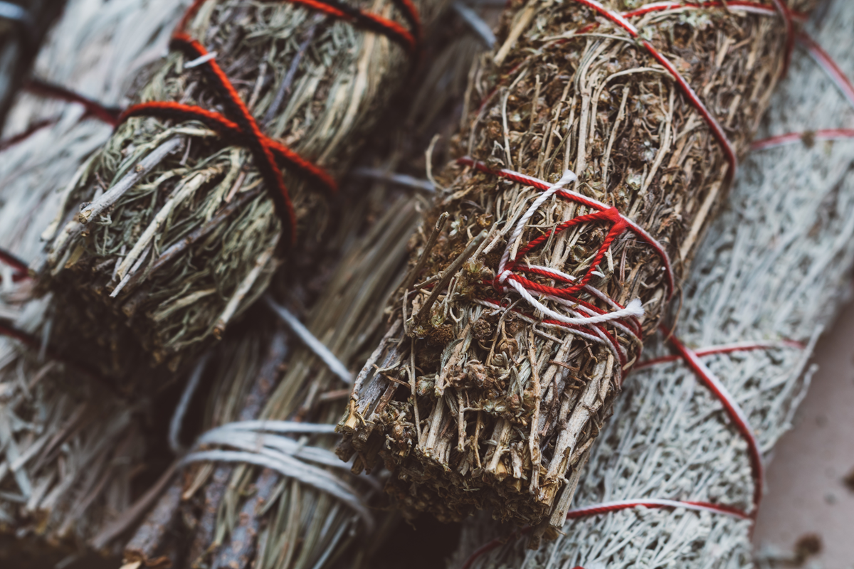 two herbal smudge sticka