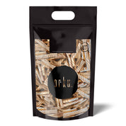 Premium Palo Santo Smudge Sticks in black and gold resealable pouch with abstract design