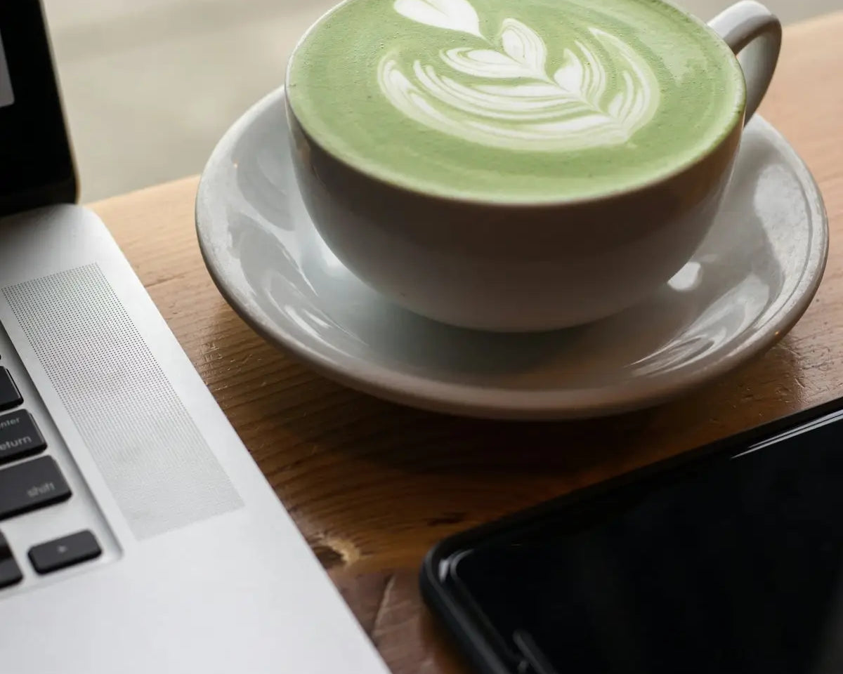 white ceramic teacup on top of white saucer