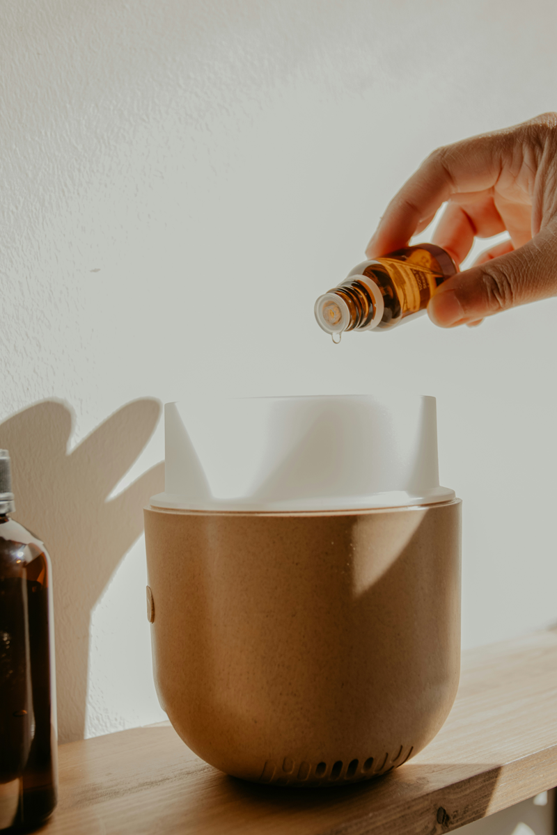 essential oil being added to diffuser