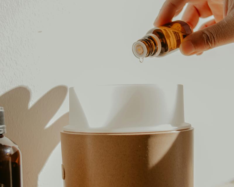 essential oil being added to diffuser