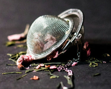 loose lea herbs in tea strainer
