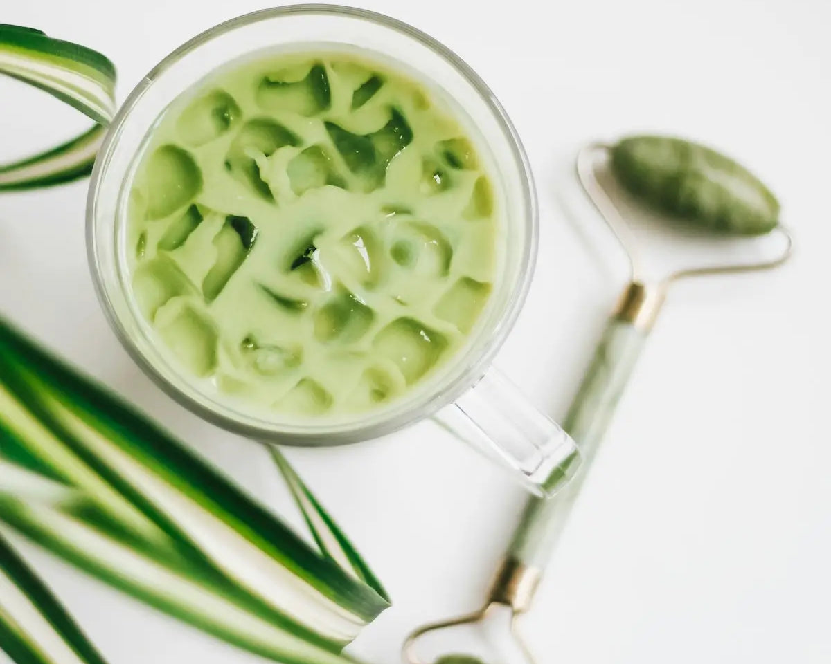 green and white ceramic bowl with green liquid
