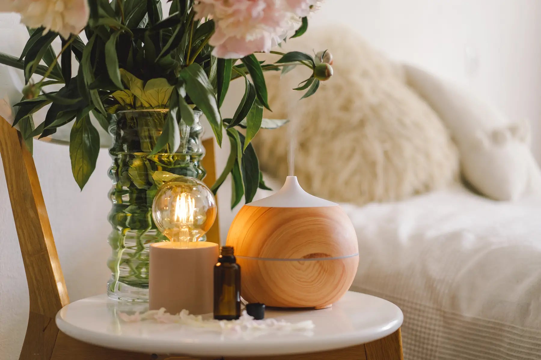 essential oil diffuser on bedside table