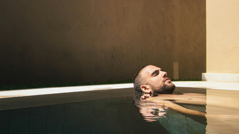 man practicing cold water therapy