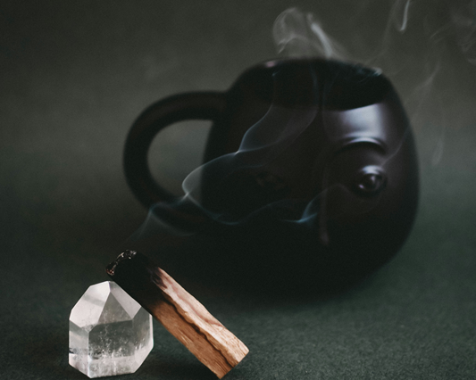 palo santo smudge stock moon mug and quartz crystal