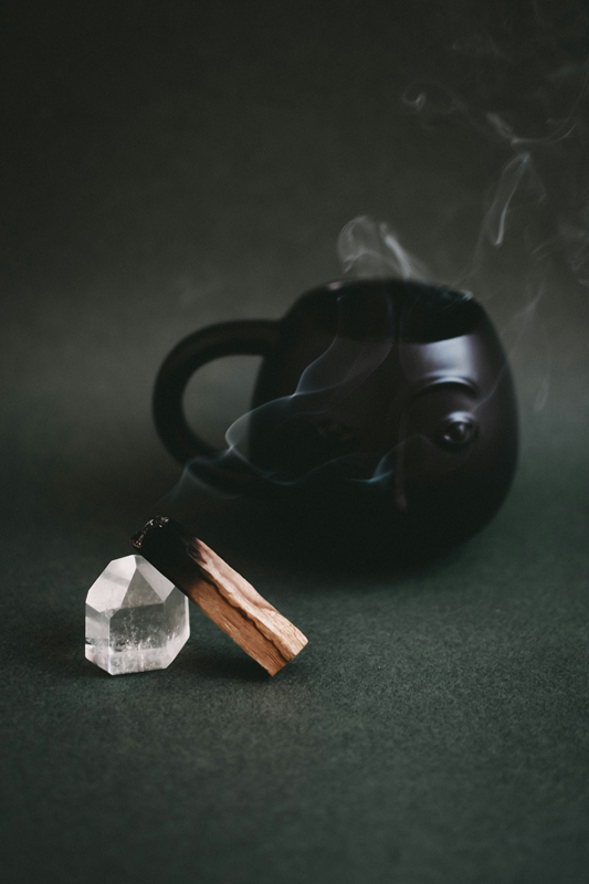 palo santo smudge stock moon mug and quartz crystal