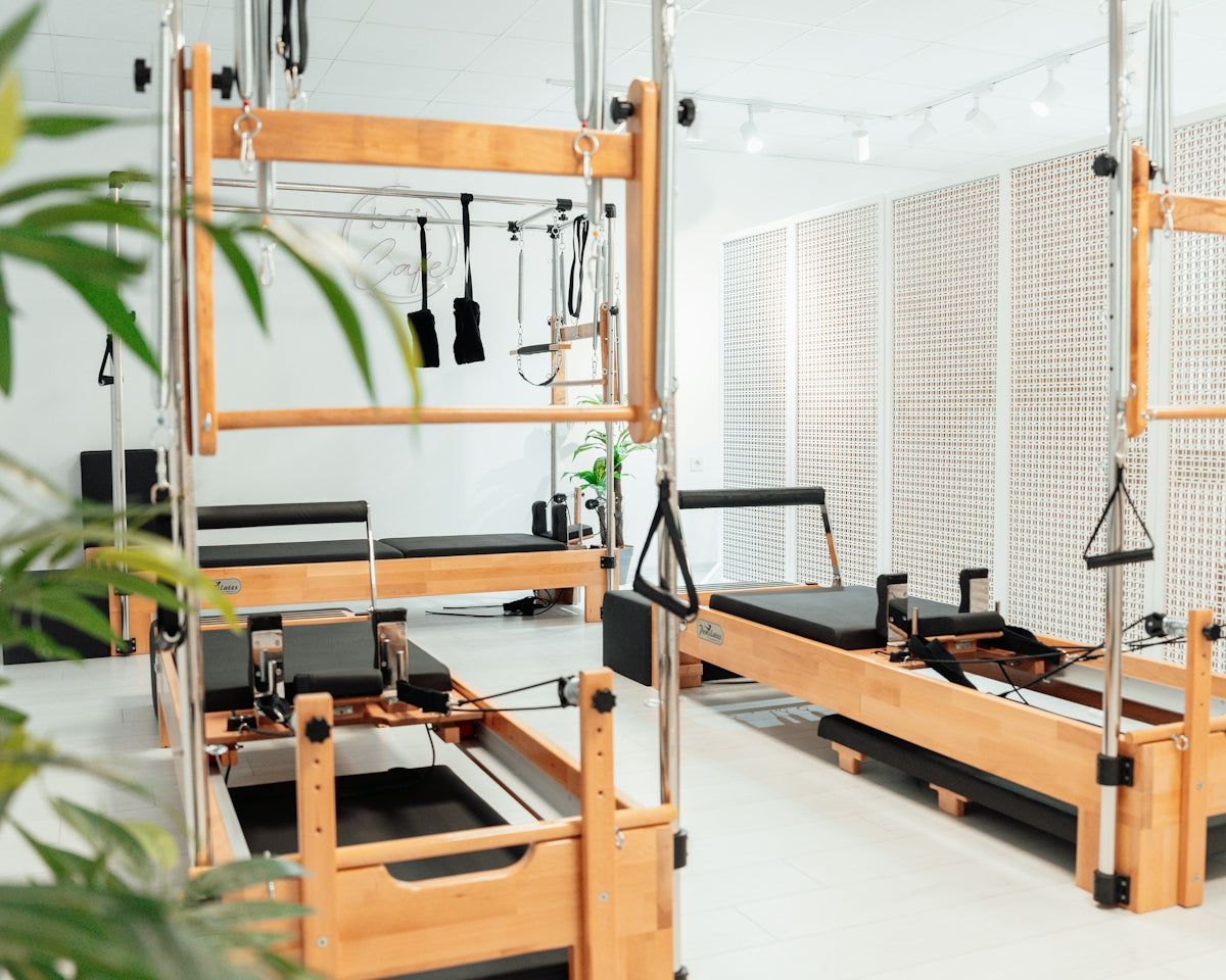 a room filled with lots of machines and a plant