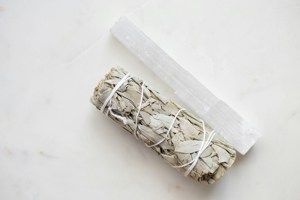 smudge stick and selenite crystal