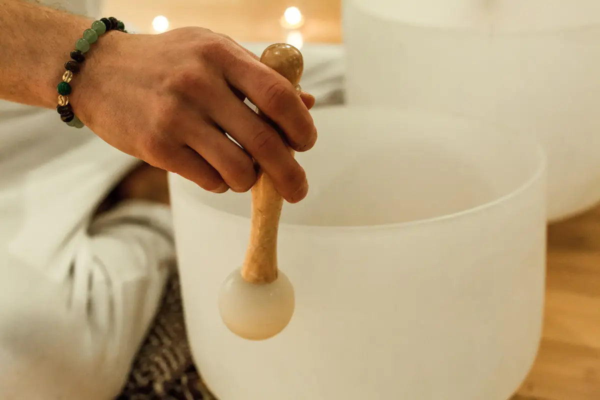 white crystal singing bowl used for therapy