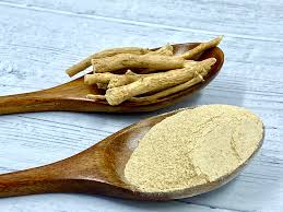 ashwagandha root and powder on spoons