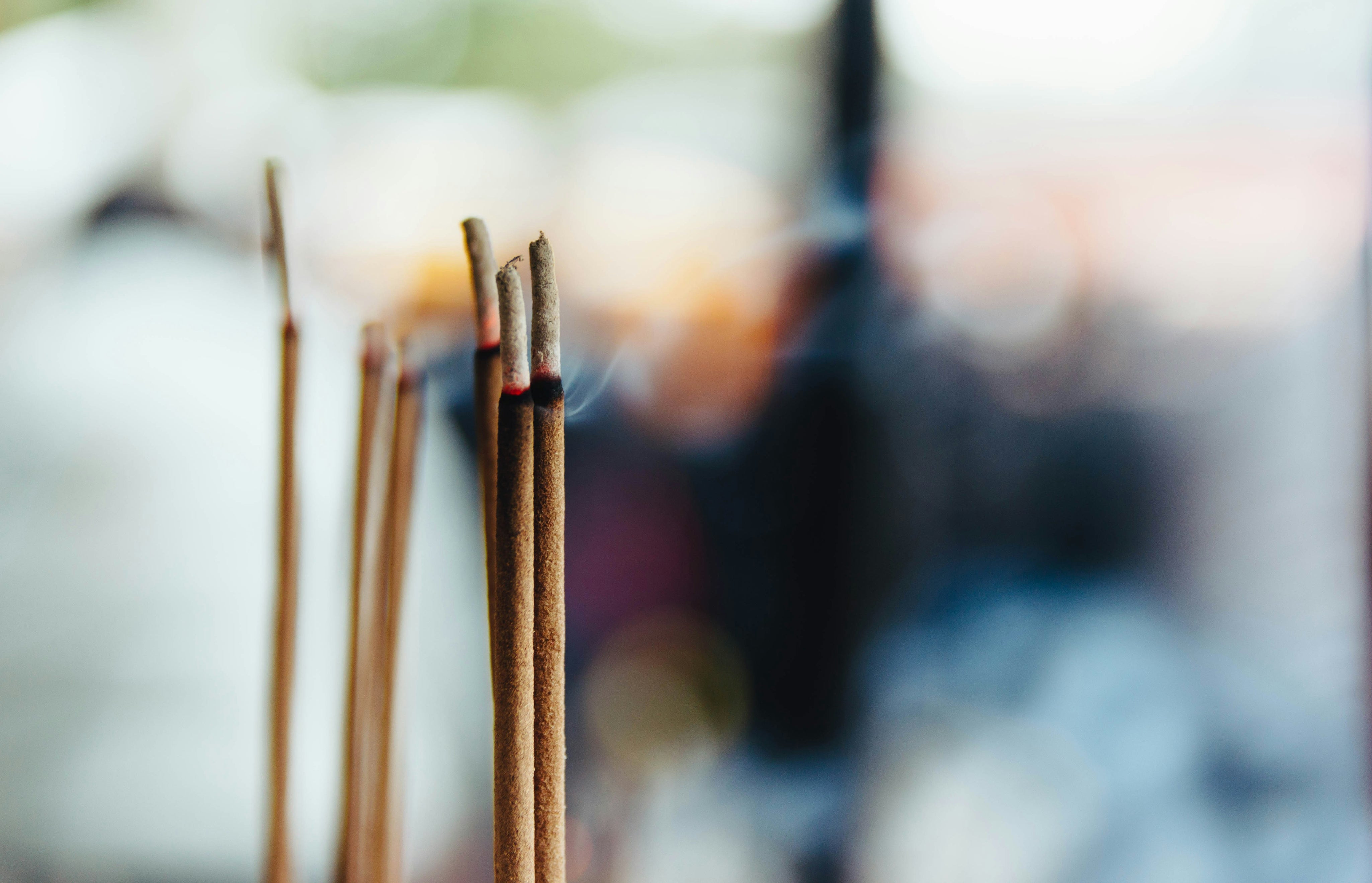 6 burning incense sticks