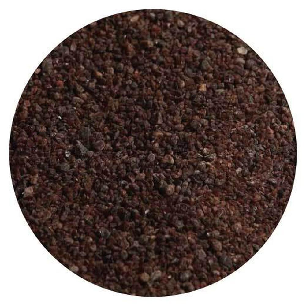 Ground coffee beans in a circular frame for 100g Fine Black Salt Himalayan product