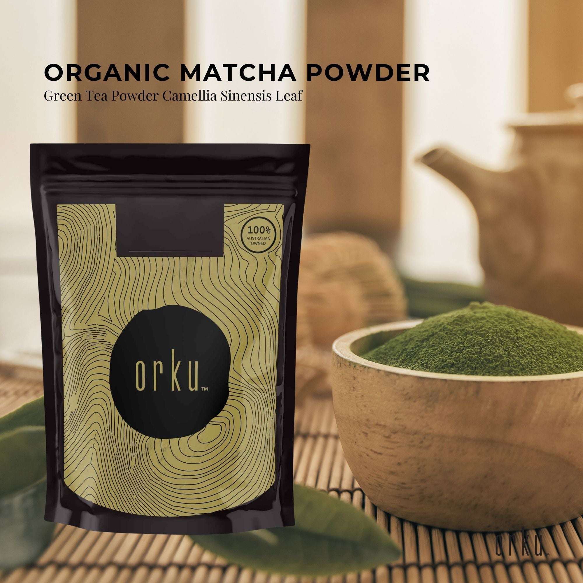 Black pouch of Orku Organic Matcha Green Tea Powder featuring a wavy gold design