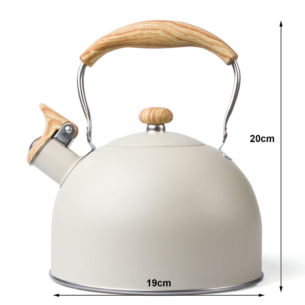 White kettle with wooden handle, a modern whistling tea pot for stovetop use