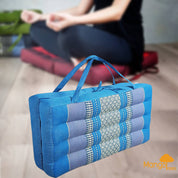 Blue and gray traditional Thai meditation cushion with carrying handles for comfort