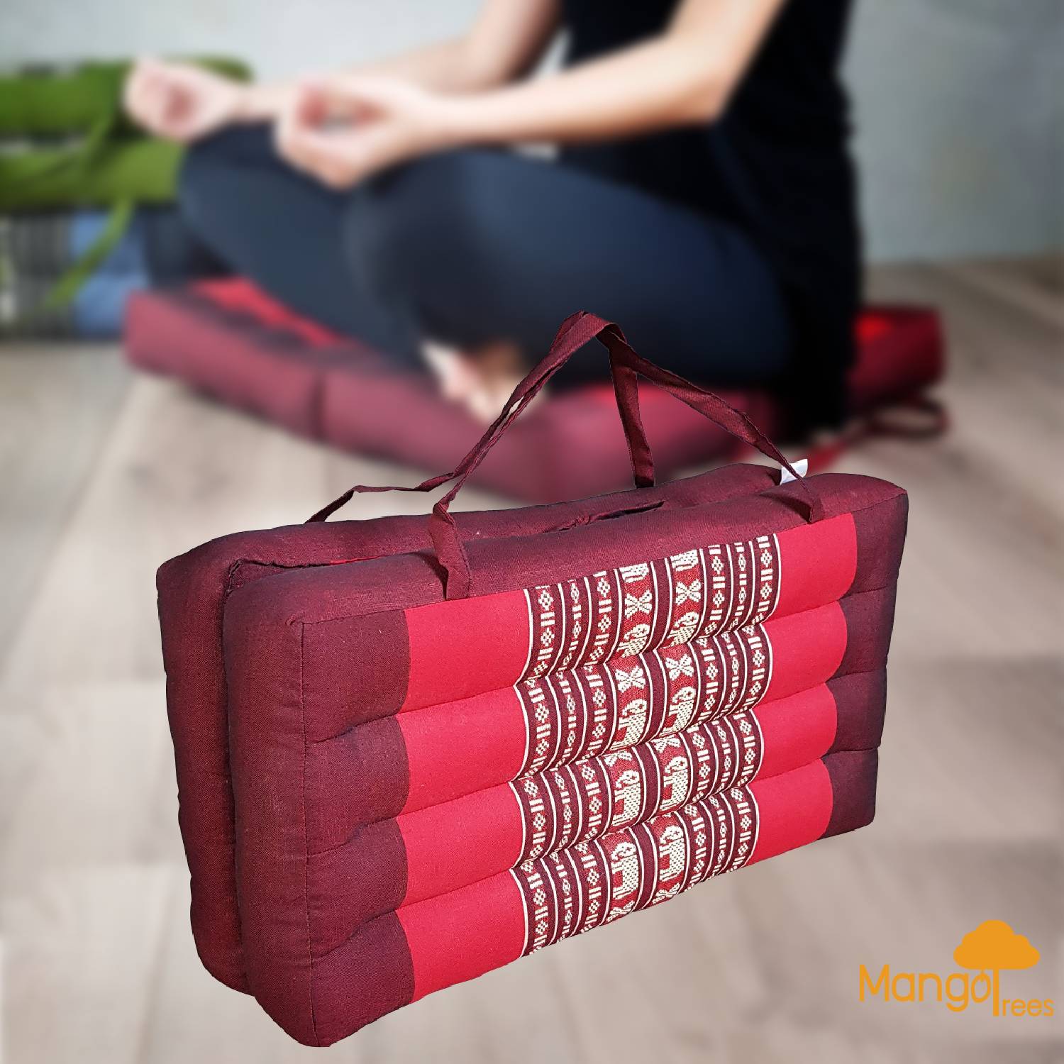 red foldable meditation pillow with carry handles