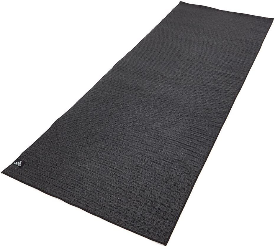 Black textured Adidas Bikram Yoga Mat with ribbed surface and webbed non-slip base