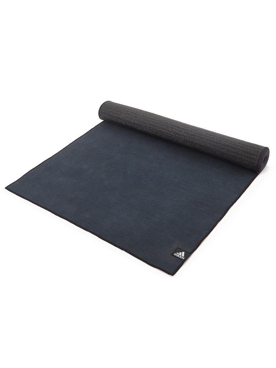 Black Adidas hot yoga mat with webbed non-slip base for Bikram Yoga and Pilates