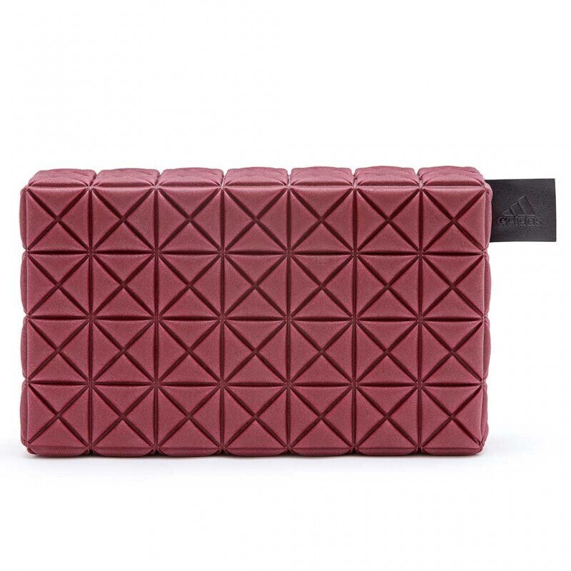 Burgundy geometric clutch bag with triangular quilted pattern for eco yoga and fitness style