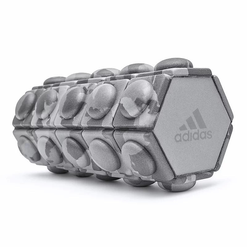 Grey hexagonal Adidas Mini Textured Foam Roller for recovery with a textured surface