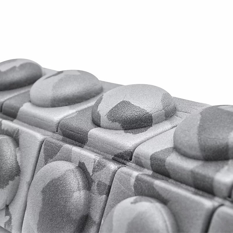 Black and white macro of keyboard keys near Adidas Mini Textured Foam Roller Recovery