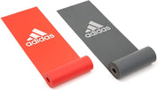 Two Adidas exercise yoga mats in red and gray with logo for use with Pilates bands