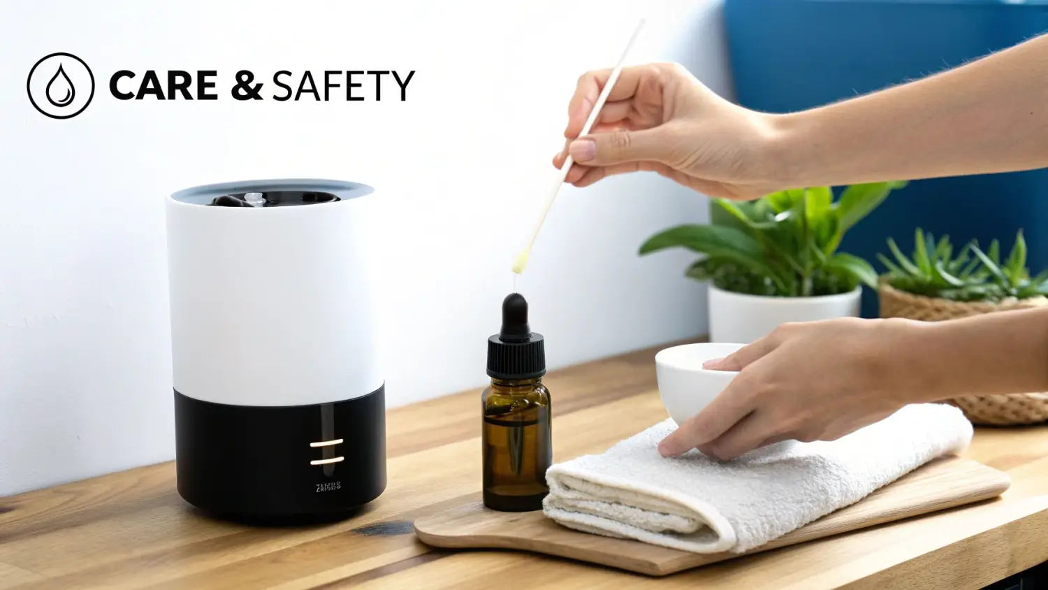 A person adding liquid from a dropper bottle next to an essential oil diffuser for care.