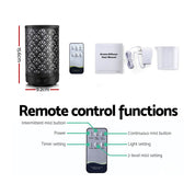 Black Devanti Aroma Diffuser with fan pattern, remote control, and whisper-quiet operation