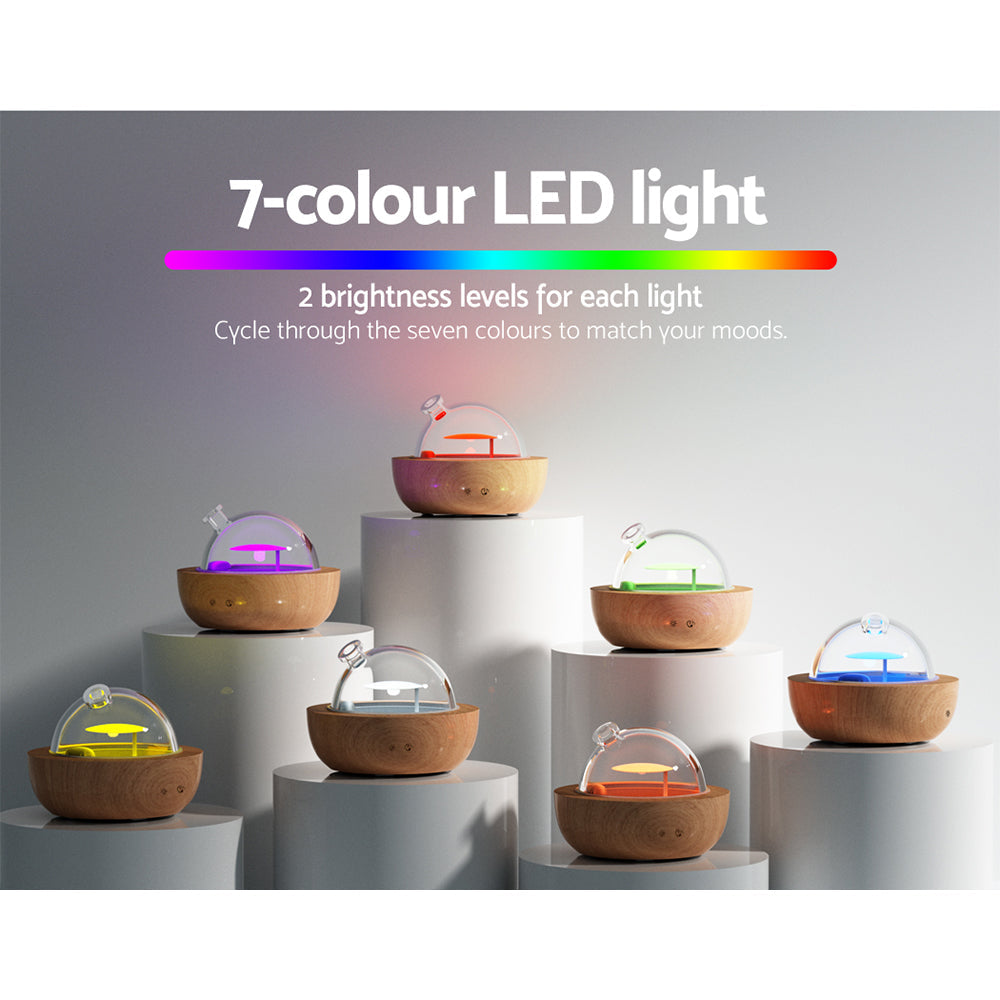 LED Diffusers with wooden bases showcasing the Devanti Ultrasonic Aroma Diffuser 7-colour LED night light