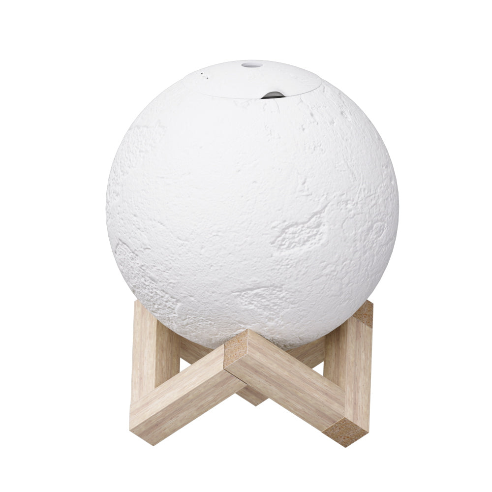 White moon-shaped lamp on wooden stand featuring touch switch as a night light