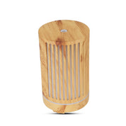 Wooden bamboo-style Essential Oil Aroma Diffuser with vertical slits and colour changing lights