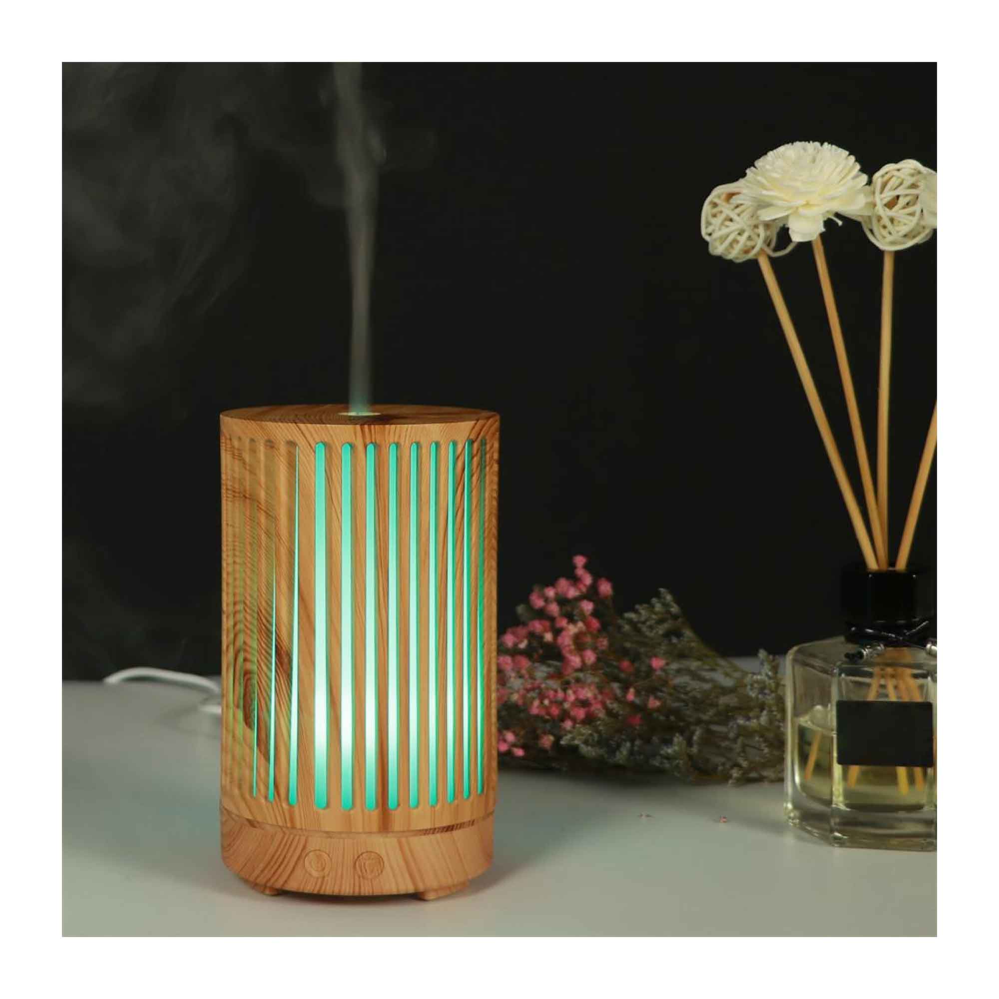 Cylindrical light wood grain ultrasonic aroma diffuser with colour changing stripes