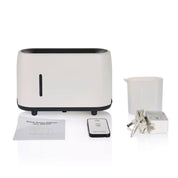 Modern minimalist white and black toaster near a white 240ml flame style oil aroma diffuser