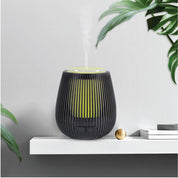 Black ribbed essential oil aroma diffuser with yellow lighting, portable ultrasonic car humidifier