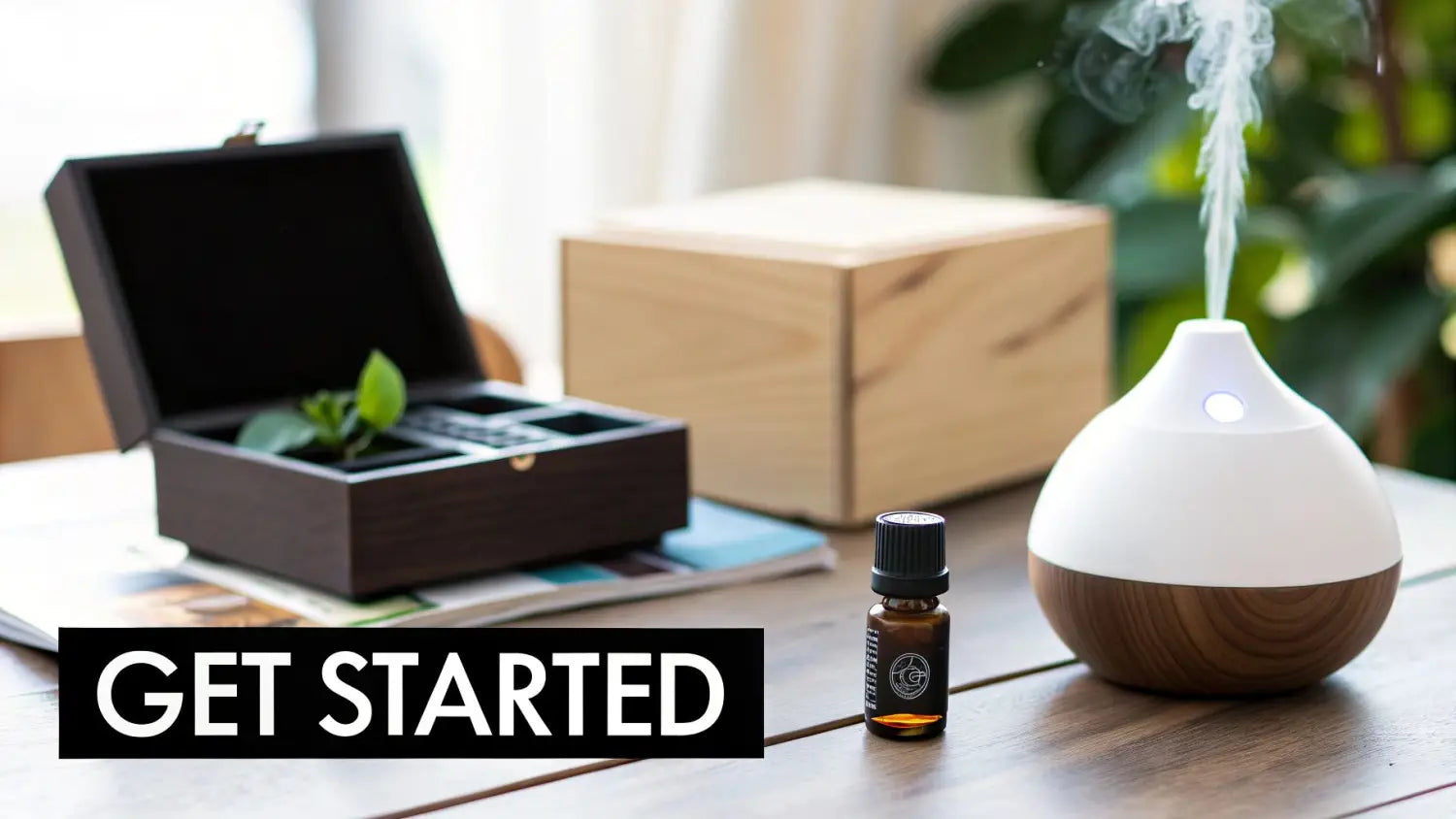A white and wood essential oil diffuser releasing mist, next to an essential oil bottle and a wooden box.