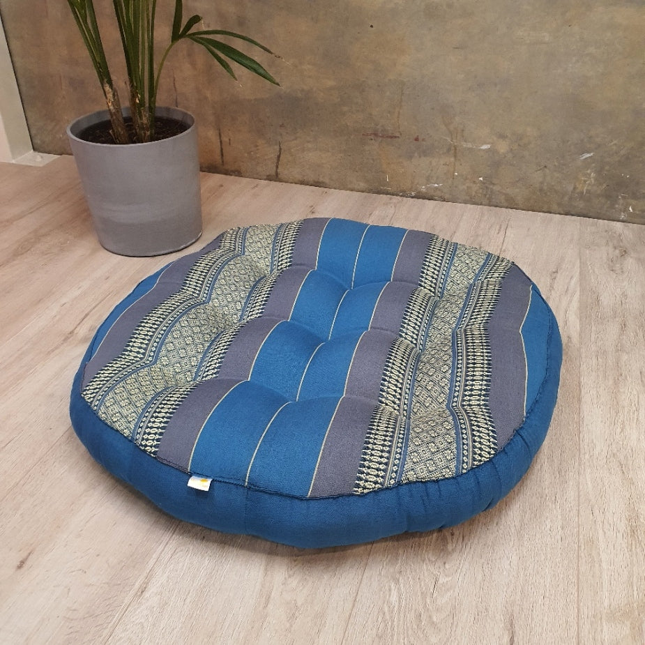 Round blue Zafu Meditation Cushion made from eco-friendly materials with striped fabric