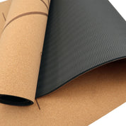 Powertrain Cork Yoga Mat featuring cork and textured black surfaces for home gym Pilates