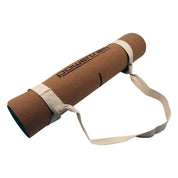 Brown Powertrain Cork Yoga Mat with beige carrying strap for home gym Pilates