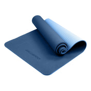 Blue Powertrain Dual Layer 8mm Yoga Mat with non-slip surface, partially rolled up