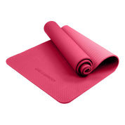 Pink Powertrain Yoga Mat partially rolled up, showcasing dual layer 6mm thickness