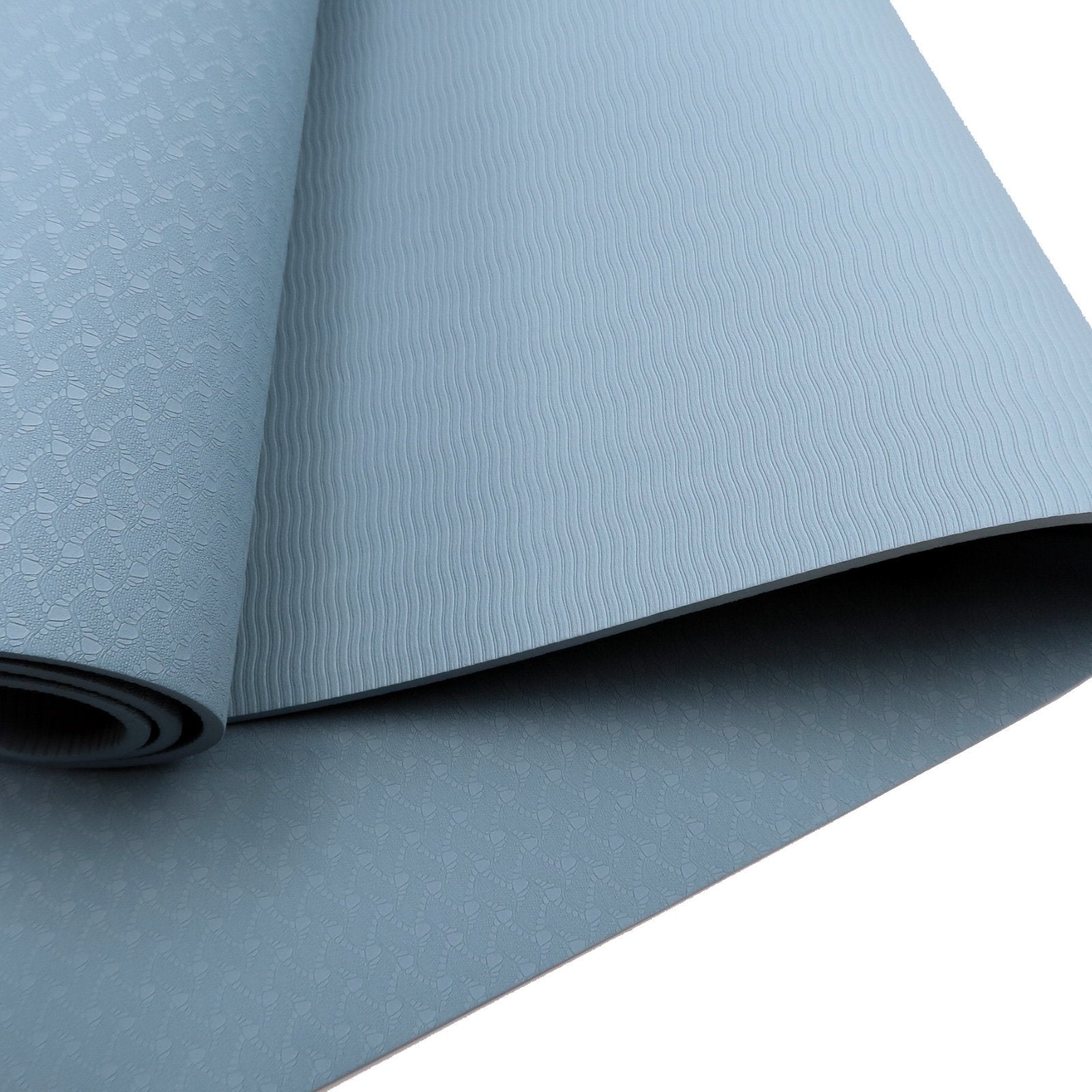 Gray textured Powertrain Eco-friendly Dual Layer 6mm Yoga Mat partially rolled up