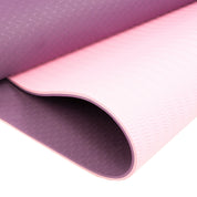 Pink and purple dual layer 8mm yoga mat with a textured non-slip surface