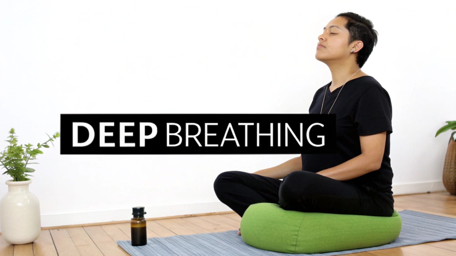 A person meditating calmly on a green cushion with 'DEEP BREATHING' text overlay.