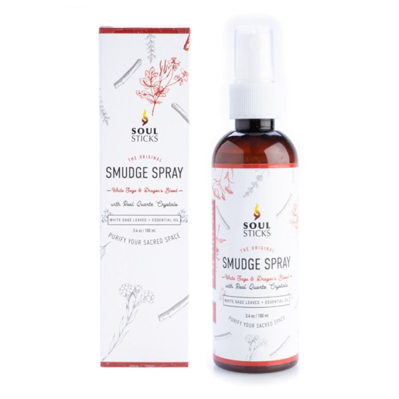 bottle of white sage and dragon blood smudging spray