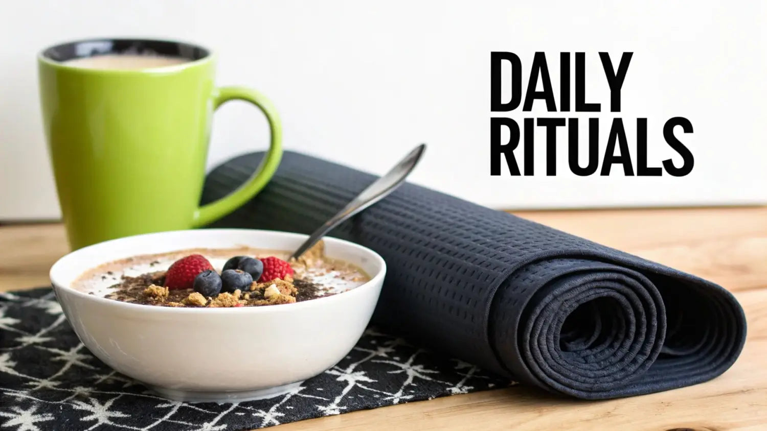 Healthy breakfast bowl with berries, yoga mat, and coffee representing daily wellness rituals